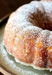 Kentucky Butter Cake on a platter dusted with powdered sugar